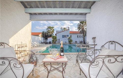 Nice home in Baixas with 4 Bedrooms, WiFi and Outdoor swimming pool