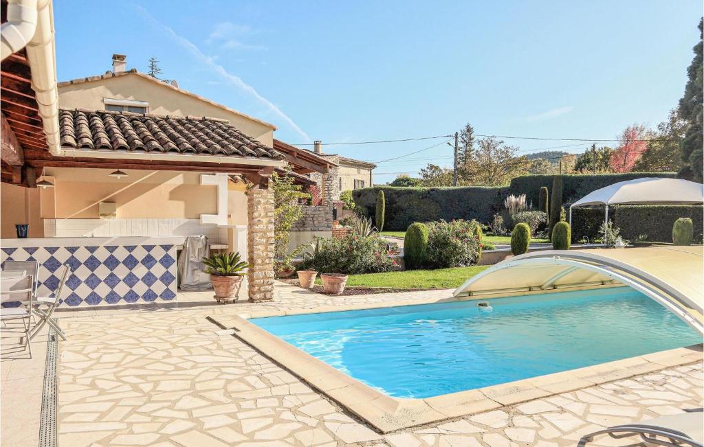 Nice home in Espeluche with Outdoor swimming pool, 3 Bedrooms and WiFi , 26780 Espeluche