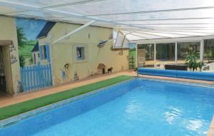 Nice home in Juigne Sur Sarthe with 4 Bedrooms, WiFi and Private swimming pool