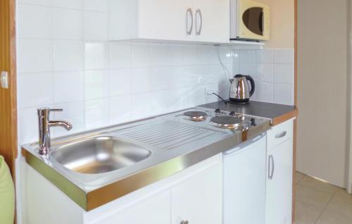 Nice home in La Chapelle En Juger with 1 Bedrooms and WiFi
