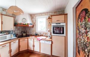 Nice home in La Jonchre with 4 Bedrooms and WiFi