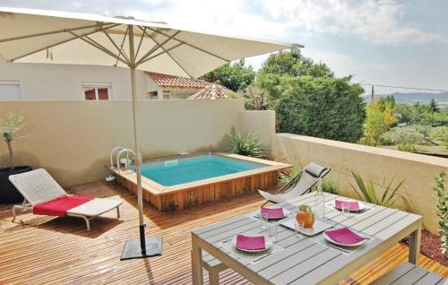 Nice home in Laudun-LArdoise with 2 Bedrooms, WiFi and Private swimming pool