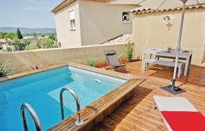 Nice home in Laudun-LArdoise with 2 Bedrooms, WiFi and Private swimming pool