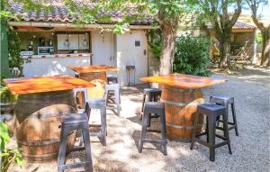 Nice home in Lespignan with Outdoor swimming pool, 5 Bedrooms and WiFi