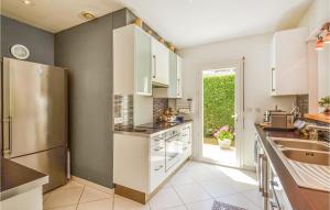Nice home in Lge-Cap-Ferret with 5 Bedrooms, WiFi and Outdoor swimming pool