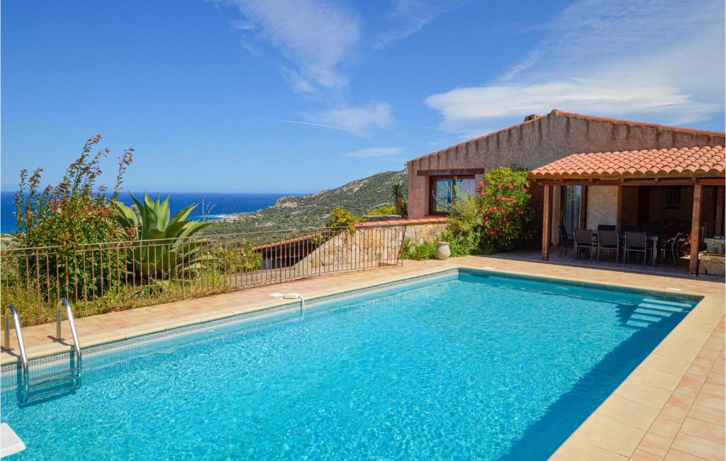 Maison de vacances Nice home in Lumio with WiFi, Heated swimming pool and 5 Bedrooms  20260 Lumio