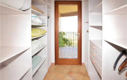 Nice home in Lumio with WiFi, Heated swimming pool and 5 Bedrooms