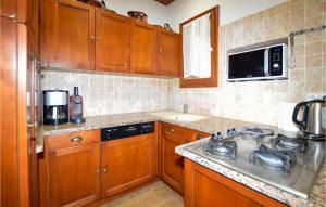Nice home in Lumio with WiFi, Heated swimming pool and 5 Bedrooms