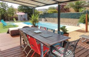 Nice home in Montblanc with 4 Bedrooms, WiFi and Outdoor swimming pool