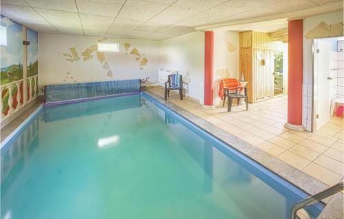Nice home in Priborn with 5 Bedrooms, Private swimming pool and Outdoor swimming pool