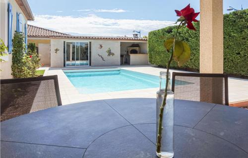 Nice home in Puisserguier with 2 Bedrooms, WiFi and Outdoor swimming pool