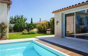 Nice home in Puisserguier with 2 Bedrooms, WiFi and Outdoor swimming pool