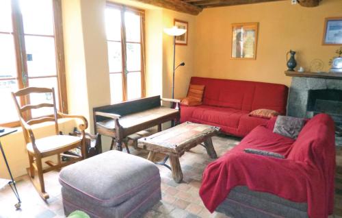 Nice home in Quettehou with 4 Bedrooms and WiFi