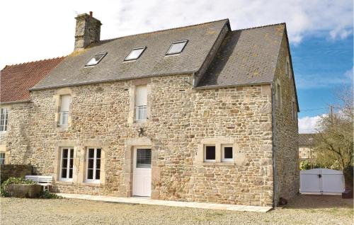Nice home in Quettehou with 4 Bedrooms and WiFi