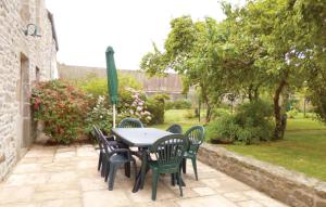 Nice home in Quettehou with 4 Bedrooms and WiFi