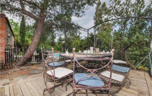Nice home in Rigarda with 5 Bedrooms, WiFi and Outdoor swimming pool