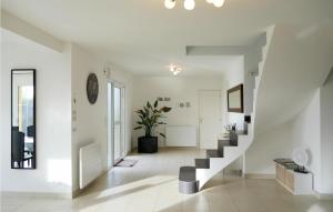 Nice home in Saint-Germain-sur-Ay with 3 Bedrooms and WiFi