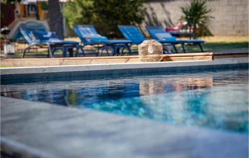 Nice home in Saint-Julien-de-Peyrol with Outdoor swimming pool and WiFi