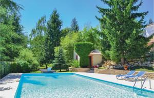 Nice home in Savignac les Eglises with 3 Bedrooms, WiFi and Outdoor swimming pool