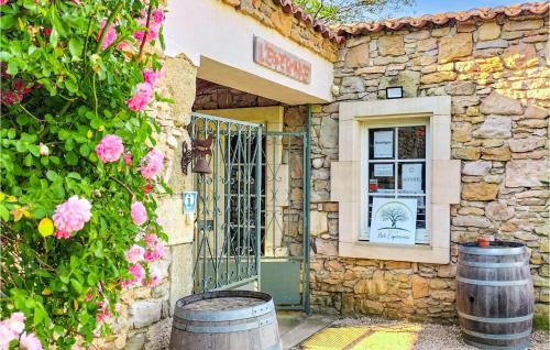 Nice home in St, Andr dOlrargues with Outdoor swimming pool, 2 Bedrooms and WiFi