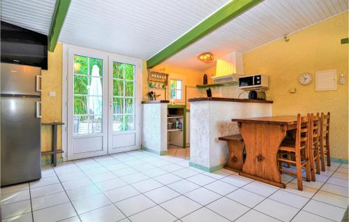 Nice home in St, Andr dOlrargues with Outdoor swimming pool, 2 Bedrooms and WiFi