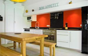 Nice home in St, Aubin de Cadeleche with 4 Bedrooms, WiFi and Outdoor swimming pool