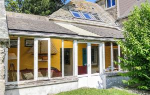 Nice home in ST GERMAIN DES VAUX with 3 Bedrooms and WiFi