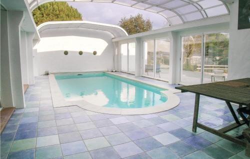 Nice home in St Maixent sur Vie with 4 Bedrooms, Private swimming pool and Indoor swimming pool