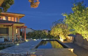 Nice home in Thezan-les-Bziers with 4 Bedrooms and Outdoor swimming pool