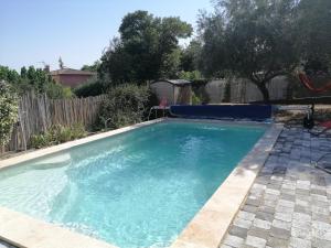 Maison de vacances Petite villa avec piscine chauffée 19 Rue des Oliviers 30350 Aigremont Languedoc-Roussillon