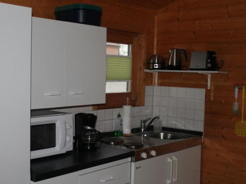 Pretty Bungalow in Neubukow with Garden, Roof Terrace, BBQ