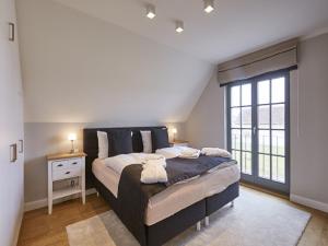 Reetland am Meer - Luxus Reetdachvilla mit 3 Schlafzimmern, Sauna und Kamin E17