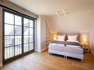 Reetland am Meer - Premium Reetdachvilla mit 3 Schlafzimmern, Sauna und Kamin E05
