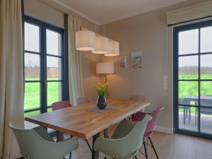 Reetland am Meer - Premium Reetdachvilla mit 3 Schlafzimmern, Sauna und Kamin F27