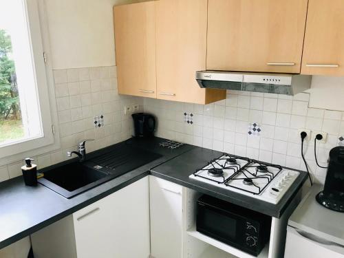 Rez-de-Jardin avec ses 2 chambres, résidence calme