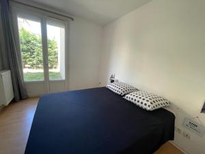 Rez-de-Jardin avec ses 2 chambres, résidence calme