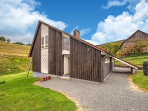 Rustic holiday home in the Hochsauerland with balcony at the edge of the forest