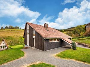 Rustic holiday home in the Hochsauerland with balcony at the edge of the forest