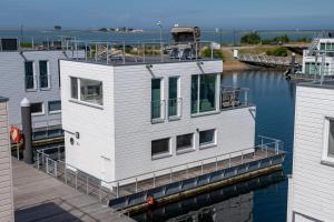 Maison de vacances Schwimmendes Haus Sea Lounge Schleidamm 18b 24376 Olpenitz Schleswig-Holstein