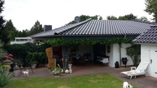Seeperle 1, Ferienhaus am Leuchtturm mit traumhaftem Garten