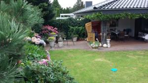Seeperle 1, Ferienhaus am Leuchtturm mit traumhaftem Garten