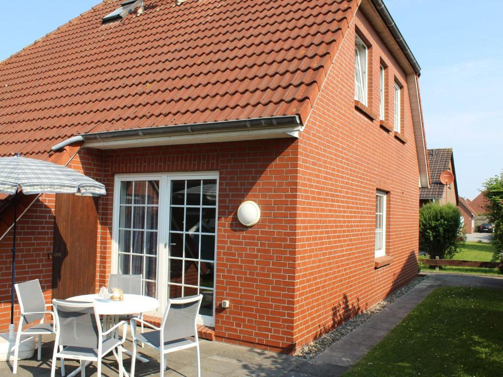 Maison de vacances Semi-detached house, Nessmersiel  26553 Nessmersiel