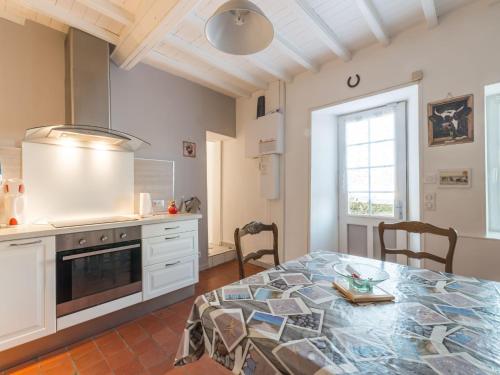 Simplistic Holiday Home in St Laurent sur Mer with Terrace