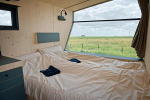 Sleep Space 21 - Green Tiny Village Harlesiel