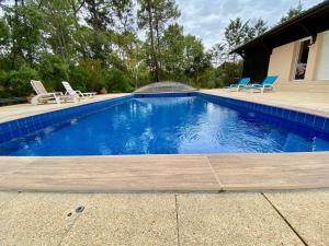 Maison de vacances Spacious villa with huge pool in quiet location close beach 24 l'Orée des Greens 33680 Lacanau Aquitaine