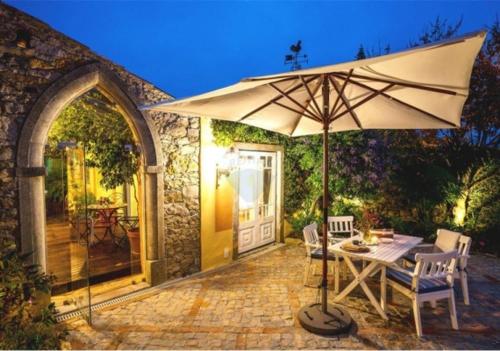 Stone-and-Style Guesthouse with shared heated Pool