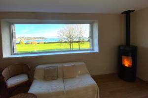 Stone house with view on the sea and the golf