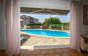 Stunning home in Aleria with 2 Bedrooms and Outdoor swimming pool