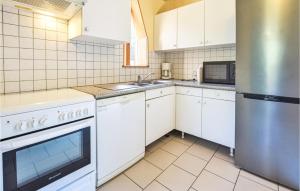 Stunning home in Bonneville-La-Louvet with WiFi and 4 Bedrooms
