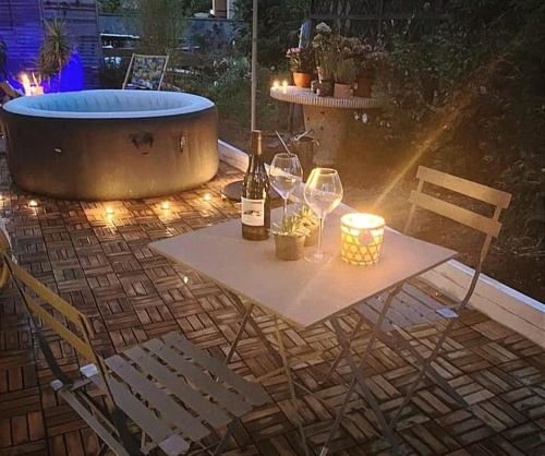 Superbe appartement avec jacuzzi avec jardin privé